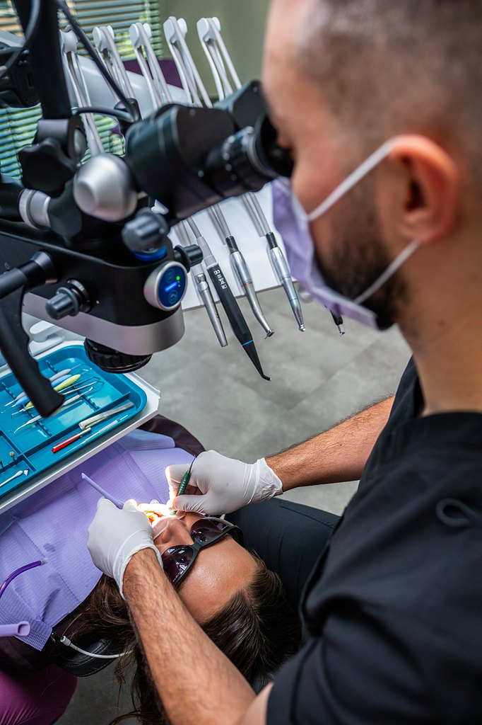 Periodontal treatment under the microscope